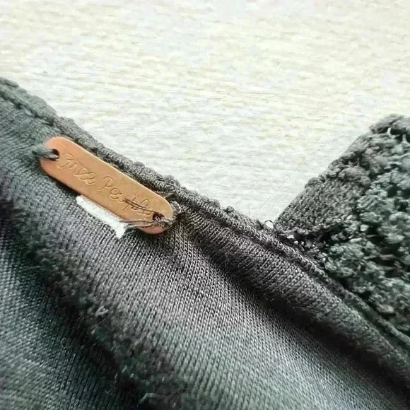 Free people black dress with cutout on the side and in the back. Size is XS/S. - Picture 11 of 12